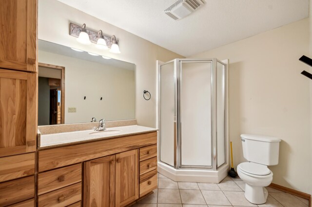 342 Soo Line Rd, Troy Twp, WI 54016 - full bathroom featuring tile patterned flooring, vanity, toilet, and a shower stall