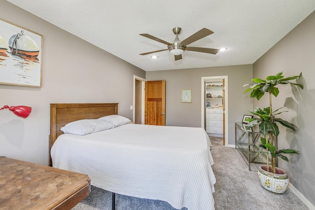 1709 140th St, Burnsville, MN 55337 - bedroom with light carpet, baseboards, ceiling fan, and recessed lighting