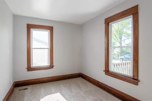 188 Wyoming St E, Saint Paul, MN 55107 - spare room featuring carpet floors and baseboards