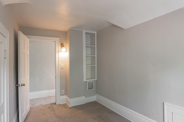 188 Wyoming St E, Saint Paul, MN 55107 - unfurnished bedroom featuring carpet flooring and baseboards