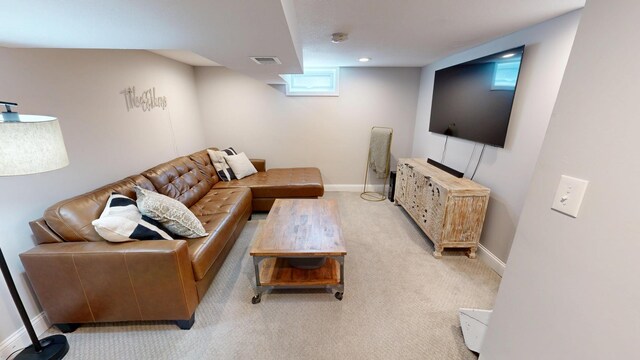 711 3rd St SE, Willmar, MN 56201 - carpeted living area with baseboards