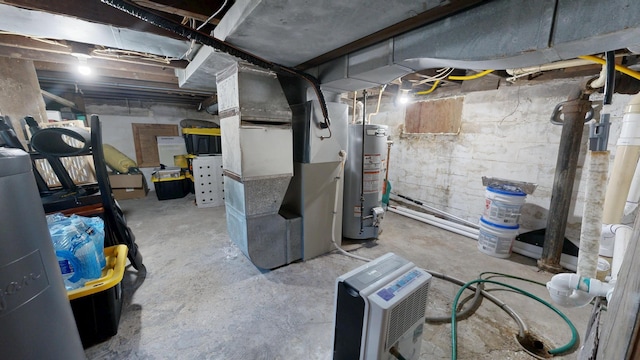 711 3rd St SE, Willmar, MN 56201 - unfinished basement featuring heating unit and gas water heater