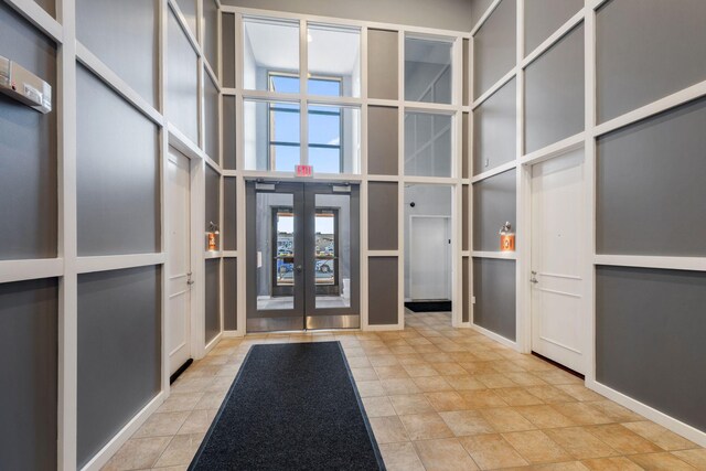 common area with a towering ceiling