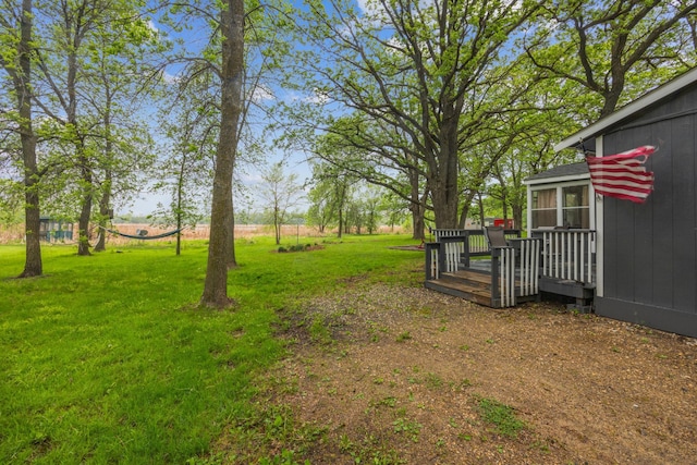 4645 Diamond Ln, Harrison Twp, MN 56209 - view of green lawn with a deck