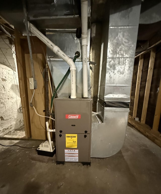 122 7th St, Montevideo, MN 56265 - utility room with heating unit