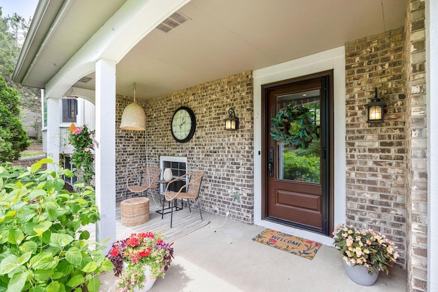 18120 Hummingbird Rd, Deephaven, MN 55391 - doorway to property with brick siding