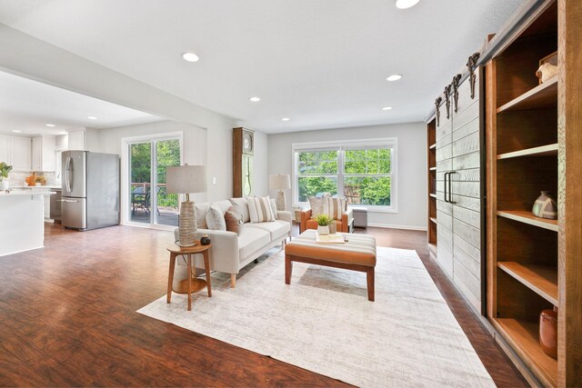 18120 Hummingbird Rd, Deephaven, MN 55391 - living area featuring recessed lighting and dark wood-type flooring