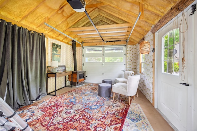 18120 Hummingbird Rd, Deephaven, MN 55391 - sunroom featuring vaulted ceiling and a wood stove