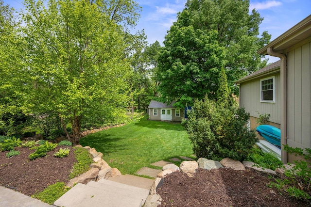 18120 Hummingbird Rd, Deephaven, MN 55391 - view of green lawn featuring an outbuilding