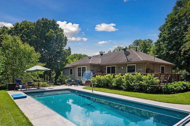 18120 Hummingbird Rd, Deephaven, MN 55391 - swimming pool with a deck, a yard, and a patio area