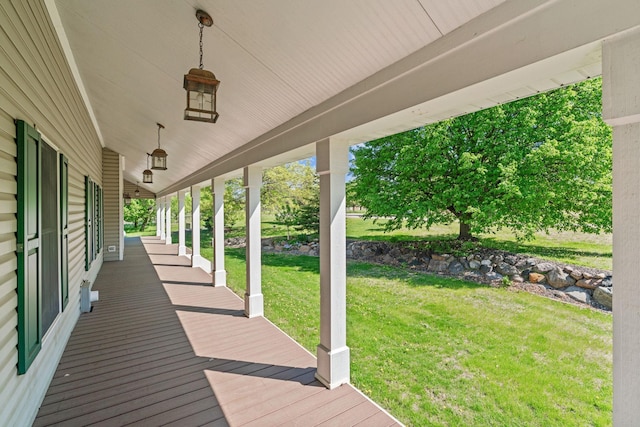 5230 Rebecca Park Trl, Greenfield, MN 55357 - wooden deck featuring a porch and a lawn