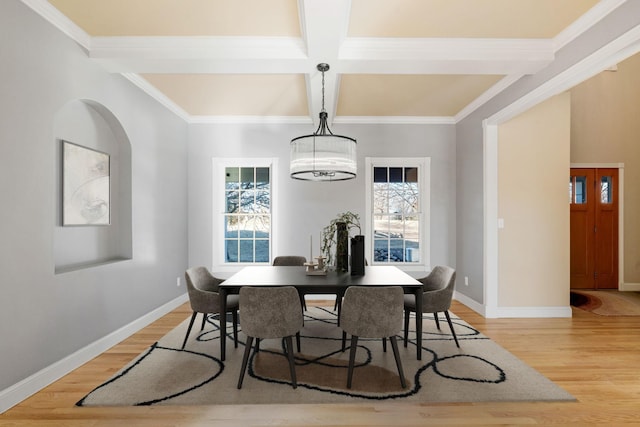 5230 Rebecca Park Trl, Greenfield, MN 55357 - dining room featuring coffered ceiling, plenty of natural light, light wood-style floors, baseboards, and crown molding