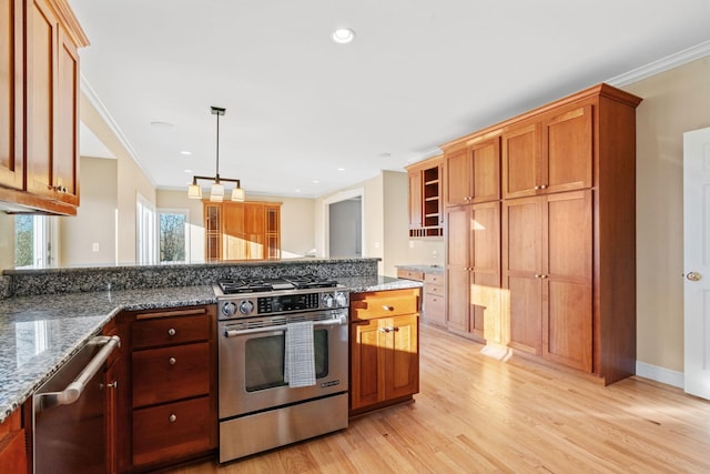 5230 Rebecca Park Trl, Greenfield, MN 55357 - kitchen featuring appliances with stainless steel finishes, light wood-type flooring, ornamental molding, dark stone counters, and pendant lighting