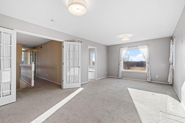 5230 Rebecca Park Trl, Greenfield, MN 55357 - unfurnished living room featuring carpet flooring, french doors, and baseboards