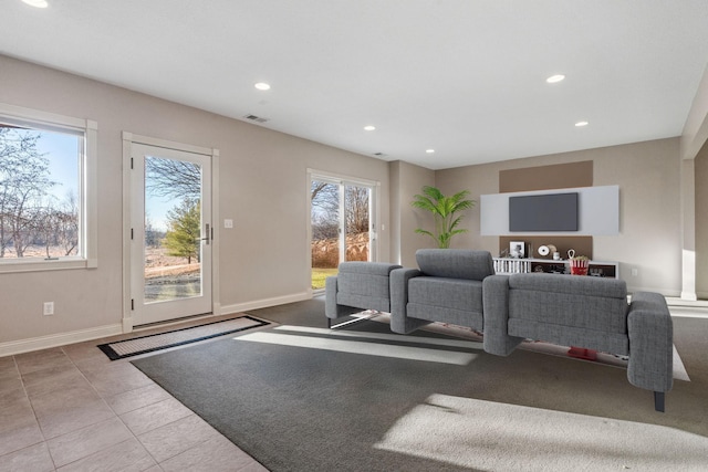 5230 Rebecca Park Trl, Greenfield, MN 55357 - tiled living room with healthy amount of natural light, recessed lighting, and baseboards
