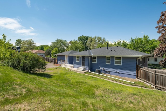 343 41st St, Minneapolis, MN 55409 - rear view of property with central air condition unit