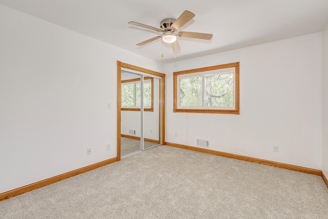 2000 191st Ave NW, Oak Grove, MN 55011 - unfurnished room with carpet, baseboards, and a ceiling fan