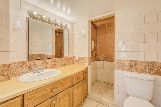 2000 191st Ave NW, Oak Grove, MN 55011 - full bath with tile walls, tiled shower, toilet, tasteful backsplash, and vanity