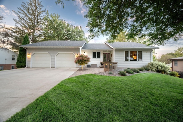 791 Highland Rd, Windom, MN 56101 - ranch-style home with a garage, concrete driveway, and a front yard