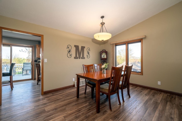791 Highland Rd, Windom, MN 56101 - dining space with plenty of natural light, dark wood-type flooring, baseboards, and lofted ceiling