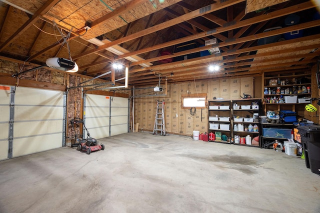 791 Highland Rd, Windom, MN 56101 - garage featuring a garage door opener