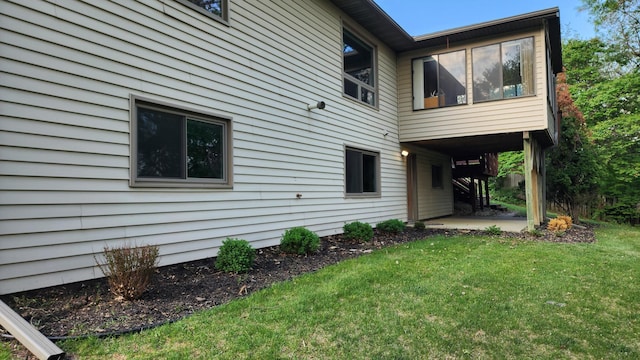 2339 2nd Ave SW, Rochester, MN 55902 - back of property with a lawn and a patio area