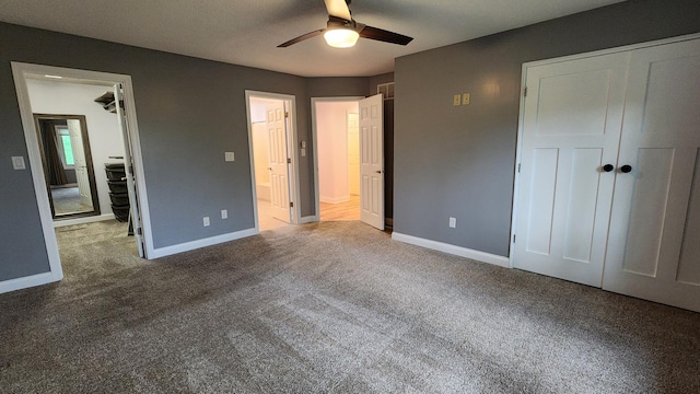 2339 2nd Ave SW, Rochester, MN 55902 - unfurnished bedroom with carpet floors, a closet, baseboards, and a ceiling fan
