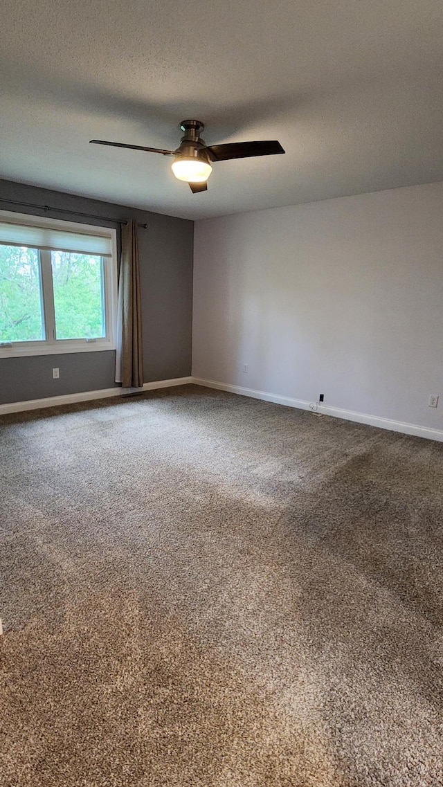 2339 2nd Ave SW, Rochester, MN 55902 - unfurnished room featuring carpet, baseboards, a ceiling fan, and a textured ceiling