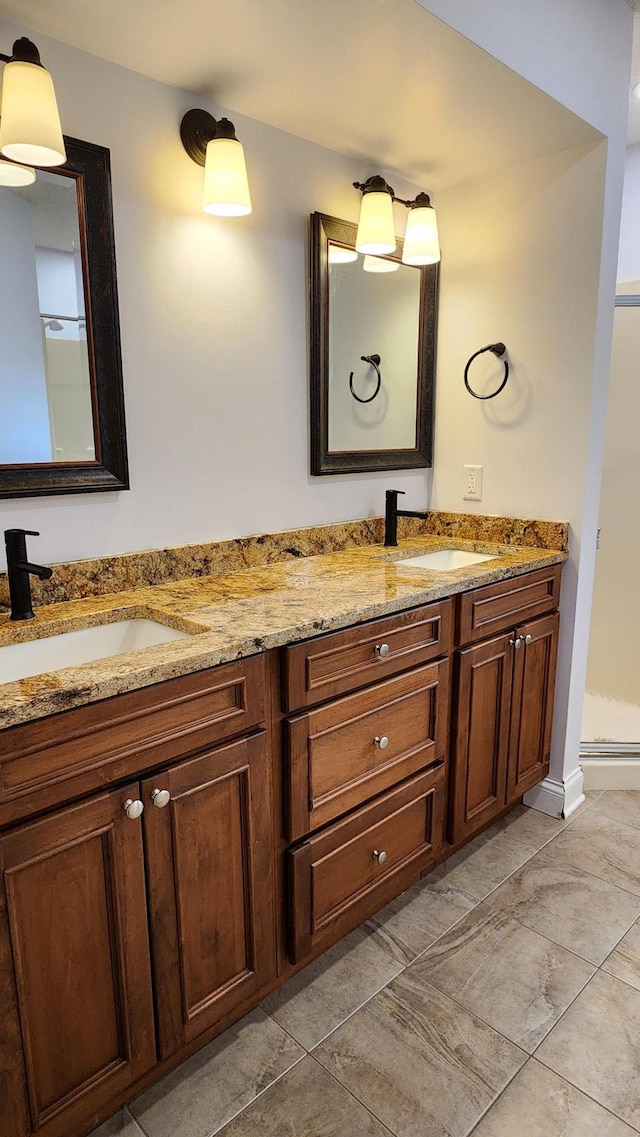 2339 2nd Ave SW, Rochester, MN 55902 - bathroom with double vanity and tile patterned flooring