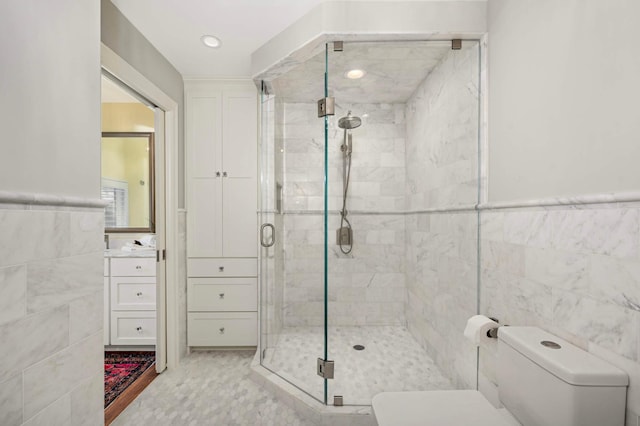 28 Greenway Gables, Minneapolis, MN 55403 - full bath with tile walls, a stall shower, and vanity