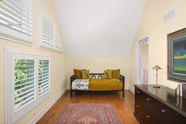 28 Greenway Gables, Minneapolis, MN 55403 - bedroom with lofted ceiling and wood finished floors