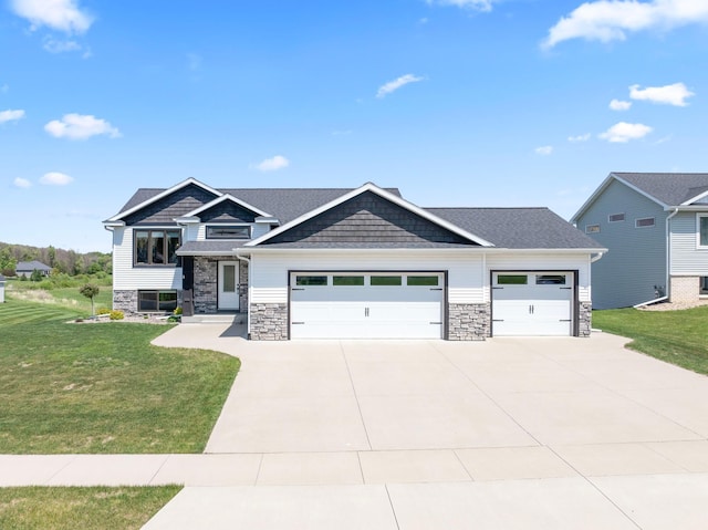 409 10th St NW, Dodge Center, MN 55927 - craftsman-style house with stone siding, a garage, a front lawn, and driveway