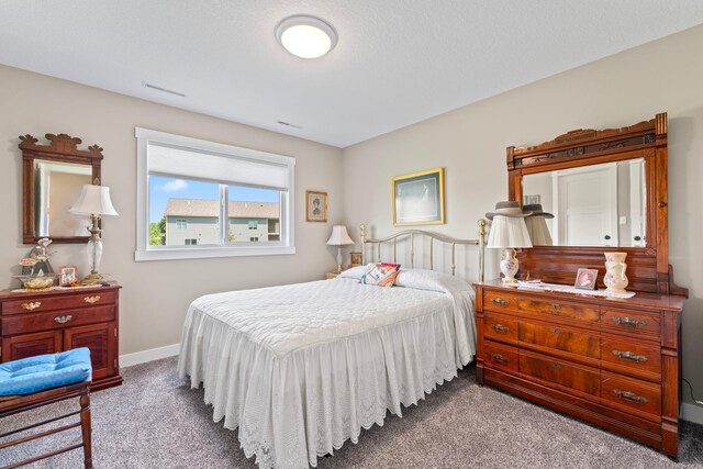 409 10th St NW, Dodge Center, MN 55927 - carpeted bedroom featuring baseboards