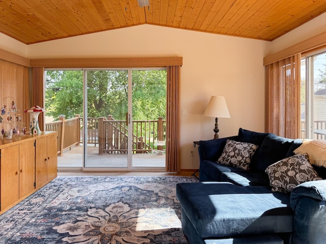 living room with lofted ceiling and wooden ceiling