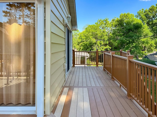 deck with view of scattered trees