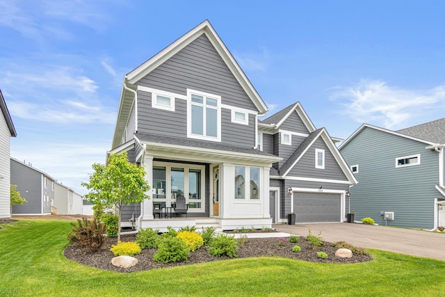 5068 Airlake Draw, Woodbury, MN 55129 - traditional-style house with covered porch, driveway, a front lawn, and an attached garage