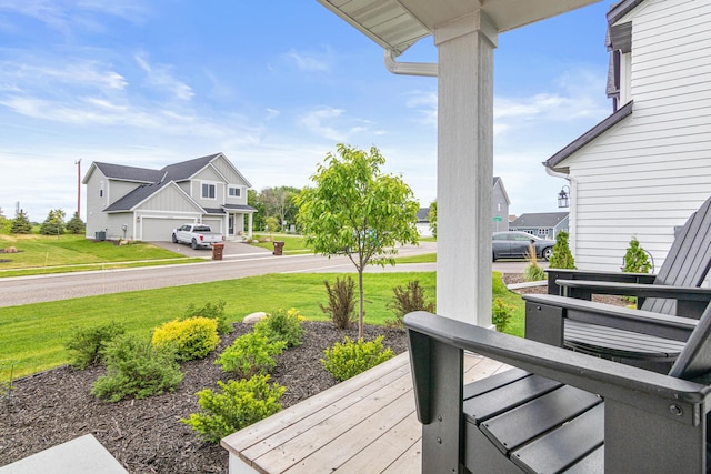 5068 Airlake Draw, Woodbury, MN 55129 - wooden deck featuring a lawn
