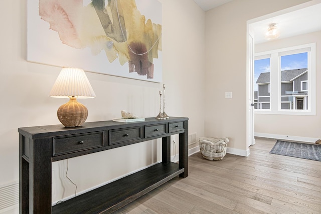 5068 Airlake Draw, Woodbury, MN 55129 - detailed view of wood finished floors and baseboards