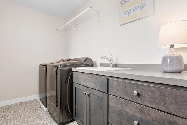 5068 Airlake Draw, Woodbury, MN 55129 - laundry area with washer and dryer, cabinet space, and baseboards