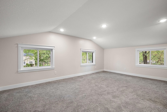 bonus room with vaulted ceiling, baseboards, carpet floors, and recessed lighting