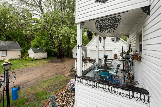 403 Spruce St, Fergus Falls, MN 56537 - deck featuring a garage