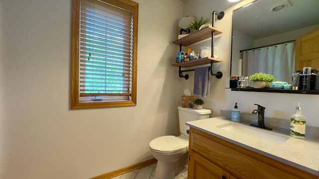 33401 Lakes Trl, Chisago Lake Twp, MN 55045 - full bathroom with toilet, vanity, baseboards, and a shower with curtain