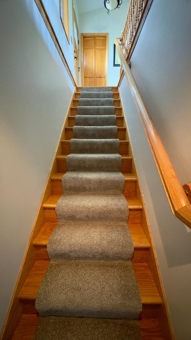 33401 Lakes Trl, Chisago Lake Twp, MN 55045 - stairway featuring wood finished floors and baseboards