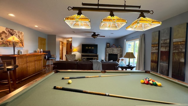 33401 Lakes Trl, Chisago Lake Twp, MN 55045 - recreation room featuring billiards, ceiling fan, a stone fireplace, recessed lighting, and bar area