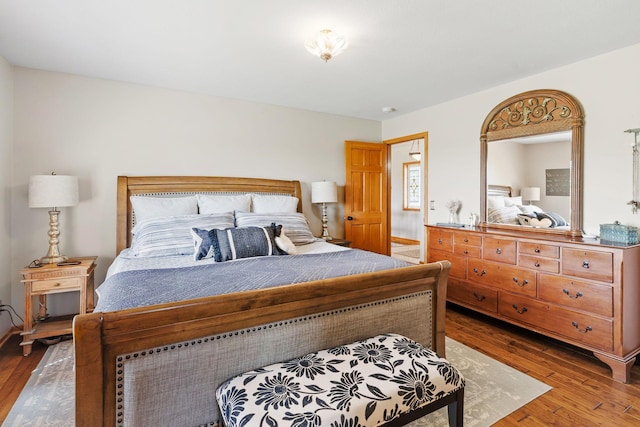 33401 Lakes Trl, Chisago Lake Twp, MN 55045 - bedroom with hardwood / wood-style flooring
