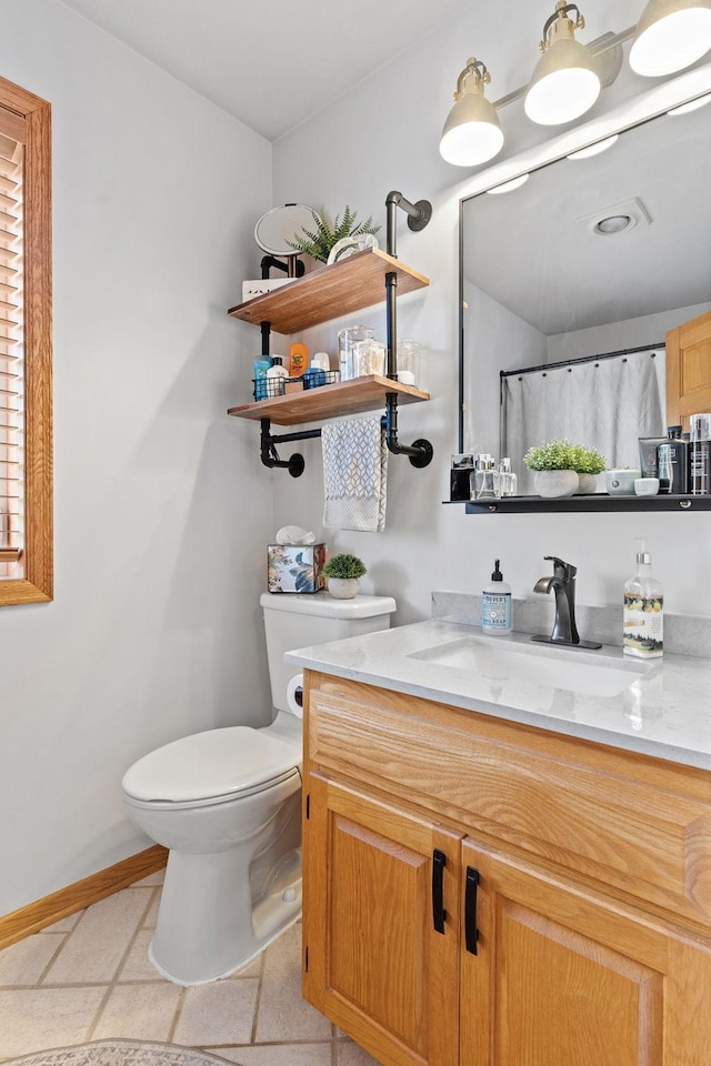 33401 Lakes Trl, Chisago Lake Twp, MN 55045 - bathroom with toilet, vanity, tile patterned floors, curtained shower, and baseboards