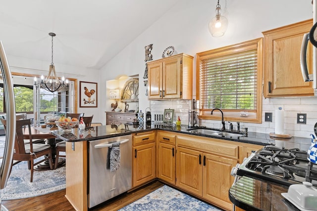 33401 Lakes Trl, Chisago Lake Twp, MN 55045 - kitchen with dishwasher, vaulted ceiling, a chandelier, healthy amount of natural light, and a sink