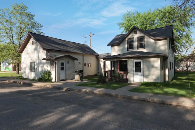 607 Wilson St, Downing, WI 54734 - view of front of home featuring covered porch