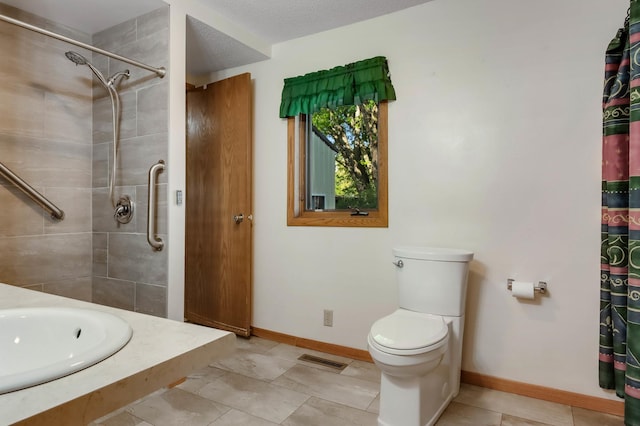 607 Wilson St, Downing, WI 54734 - full bathroom featuring tiled shower, baseboards, toilet, and a sink