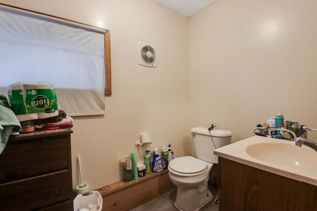 607 Wilson St, Downing, WI 54734 - bathroom with toilet and vanity